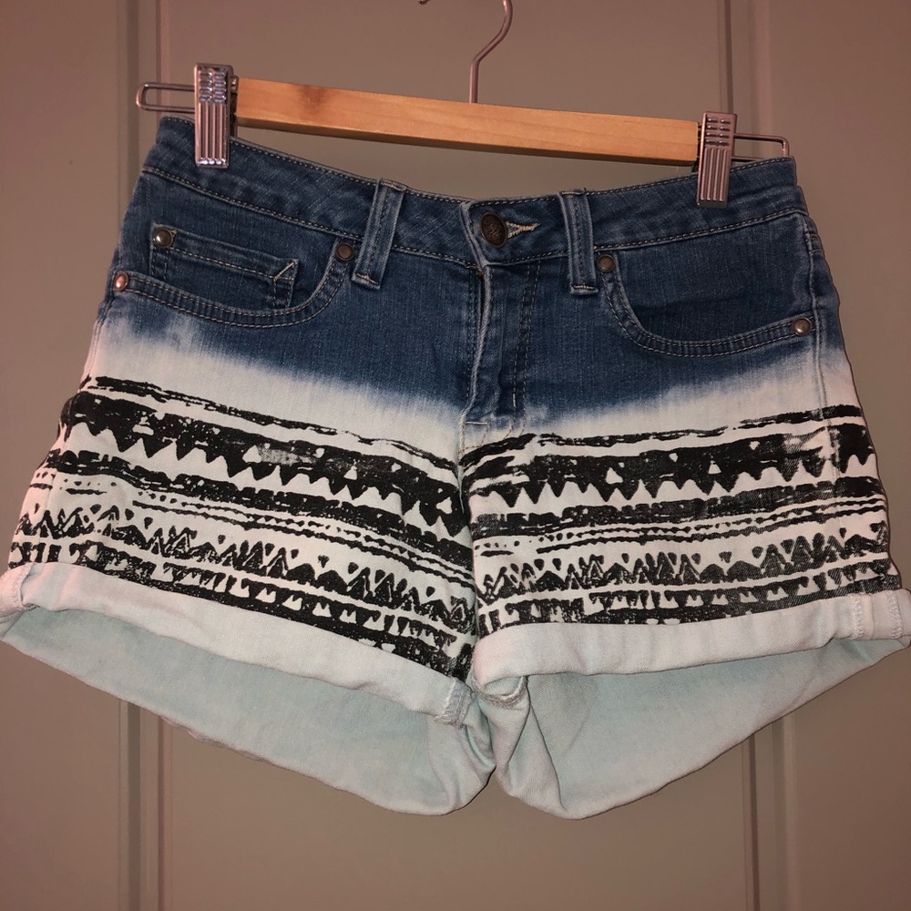 Patterned bleached blue jean shorts